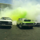 Illustration for article titled Watch A Record-Breaking 103 Cars Do A Mega Burnout To Ring In 2015
